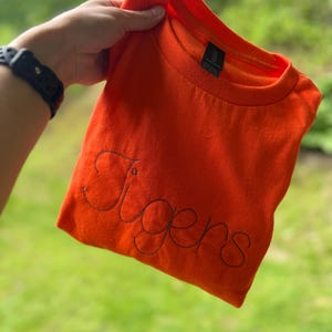 Katie added a photo of their purchase