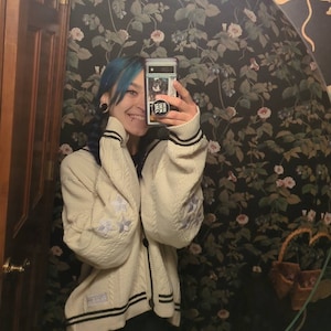 Sarah added a photo of their purchase