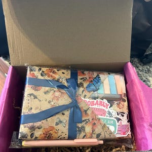 Ashleigh added a photo of their purchase