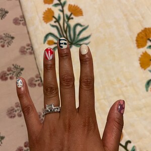 Nikita added a photo of their purchase