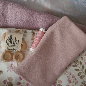Sarah added a photo of their purchase
