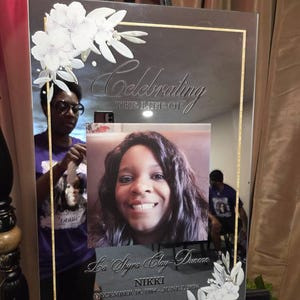 Latoya added a photo of their purchase