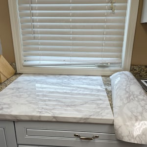 Michelle added a photo of their purchase