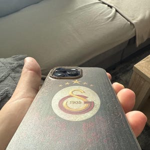 Sinan added a photo of their purchase