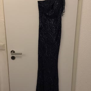 Jasmin added a photo of their purchase