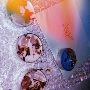 Maggie Burke added a photo of their purchase