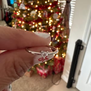 Karine added a photo of their purchase