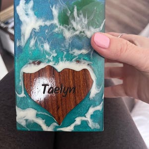 Gloria added a photo of their purchase