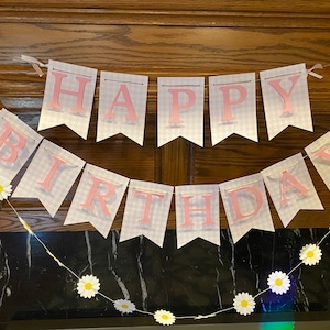 Modello di striscione per il primo compleanno a quadretti rosa