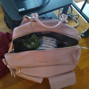 Ashley added a photo of their purchase