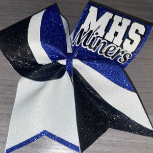 Orange black and white custom cheer bow. Great school cheer bow, dance bow, competition cheer bow, sideline cheer bow, recreation cheer