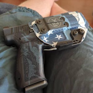 Kenneth added a photo of their purchase