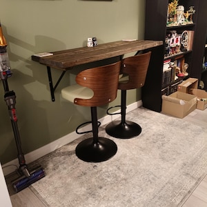 Rebekah added a photo of their purchase