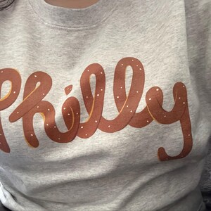 Kaylie added a photo of their purchase