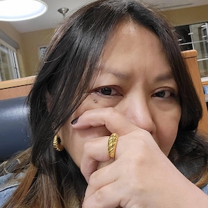 Arlene added a photo of their purchase