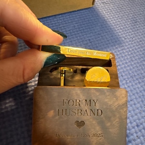 Elizabeth added a photo of their purchase