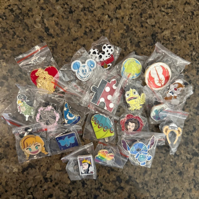 We have a limited quantity of Disney Pin Lot clearance pins for pin  trading. Description from pincastle.com. I…