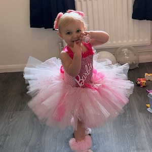 Barbie Costume Déguisement Barbie Officiel Rubie's - Robe Tutu Rose Ballerine - Enfant 7-8 Ans (117-128 Cm