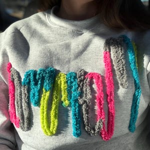 Ashley added a photo of their purchase