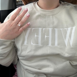 Kayley added a photo of their purchase