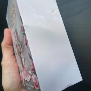 Helen added a photo of their purchase