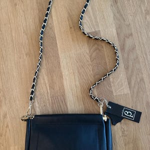 Mai added a photo of their purchase