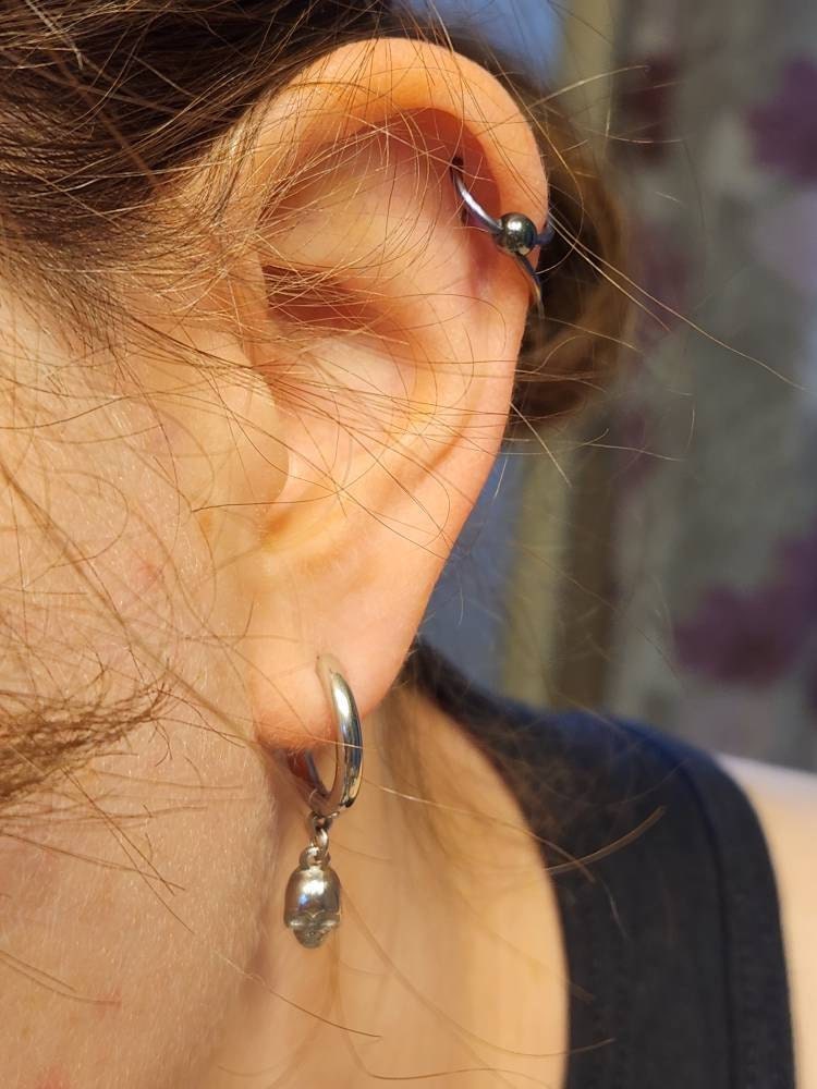 Pair of 316L Surgical Steel Hoop Earrings with Skull Dangle • 20ga