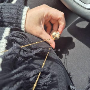 Alexandra added a photo of their purchase
