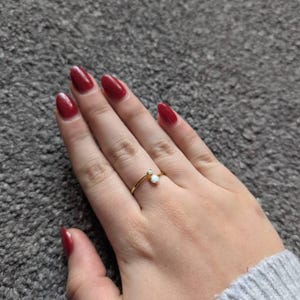Becky added a photo of their purchase