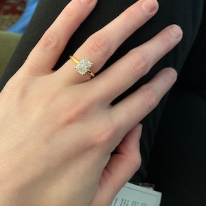 Ashley added a photo of their purchase