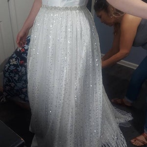 Saprina added a photo of their purchase