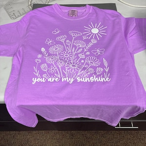Courtney added a photo of their purchase