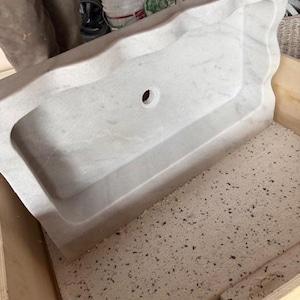 Emily added a photo of their purchase