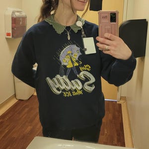 Sarah added a photo of their purchase
