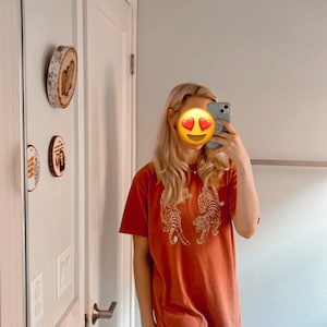 Alexandra added a photo of their purchase