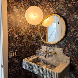 Natalie added a photo of their purchase