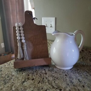 Laura Lay added a photo of their purchase