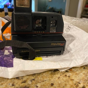 Appareil Photo Instantané Polaroid 600 Impulse AF – Avec Autofocus Et Flash – Testé