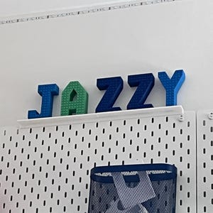 Jazzy lade till en bild av sitt köp
