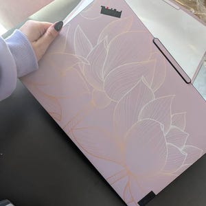 Isabella added a photo of their purchase