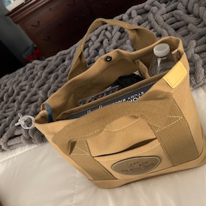 Gina added a photo of their purchase
