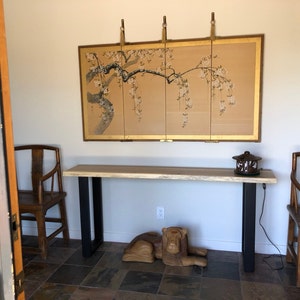 Leslie added a photo of their purchase