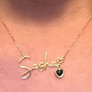 Sasha added a photo of their purchase
