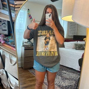Alicia added a photo of their purchase