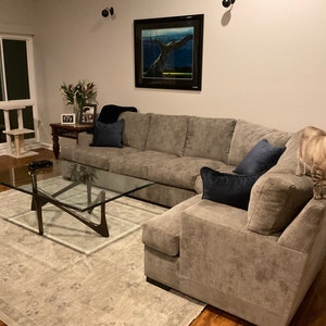 Sheila added a photo of their purchase