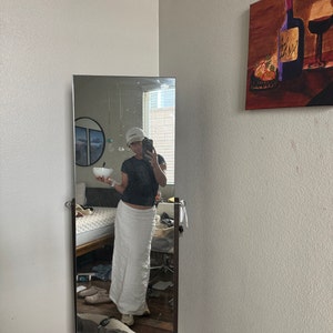 Helena added a photo of their purchase