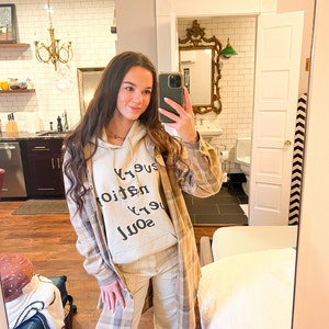 Jenna added a photo of their purchase