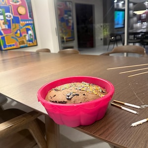 Rania added a photo of their purchase