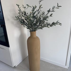 Alicia added a photo of their purchase