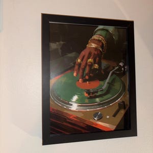 Tenisha added a photo of their purchase